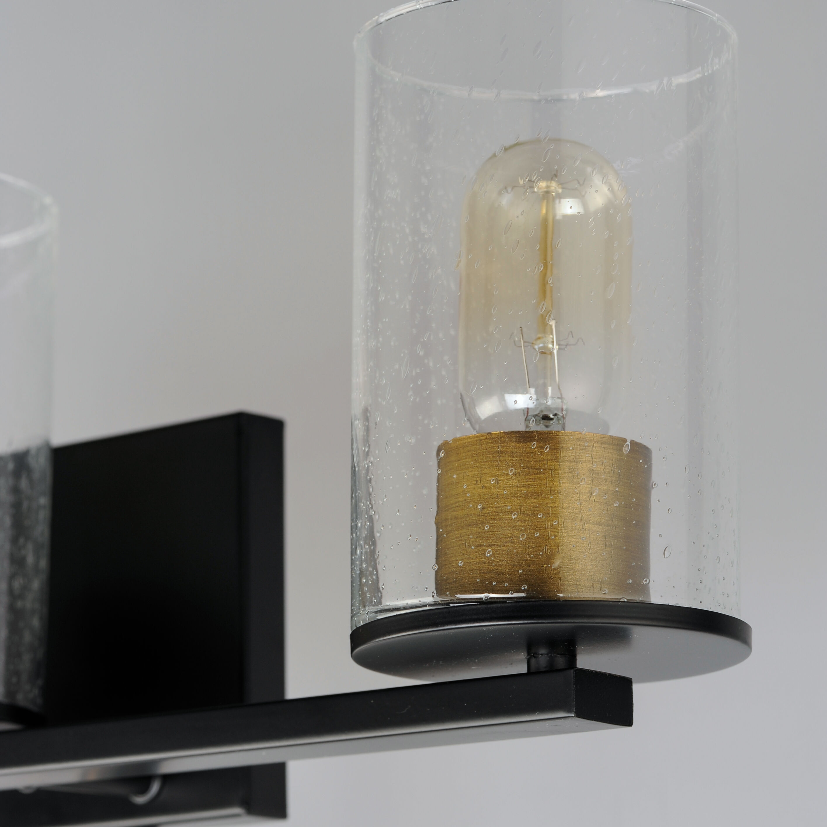 Sleek 3 Light 24 inch Antique Brass/Black Bath Vanity Wall Light