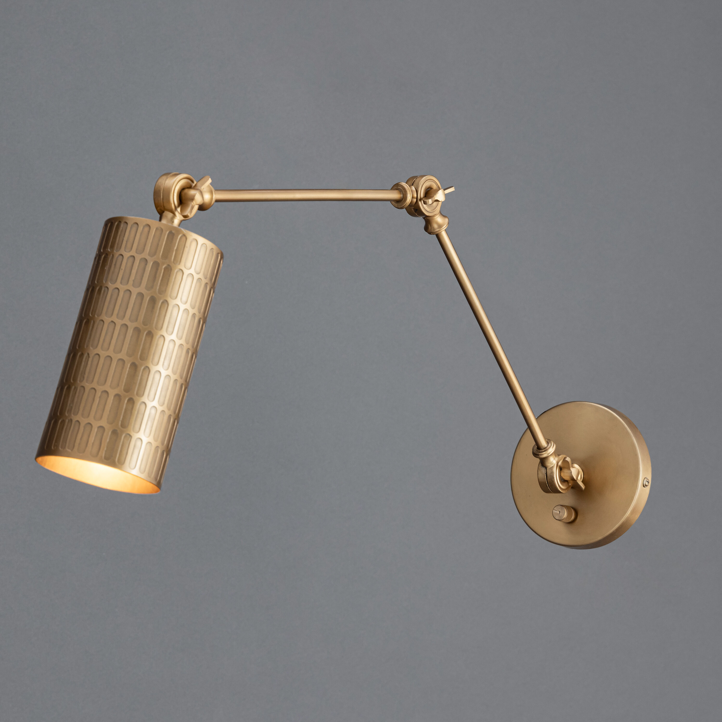 Shaka Wall Sconce Wall Light in Weathered Brass